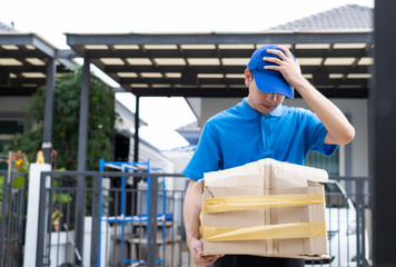 Delivery man Frightened with cardboard box damaged broken accident before delivering to customers...