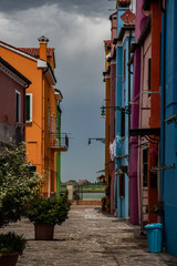  colorful houses in Burano island near Venice in a cloudy day, Italy