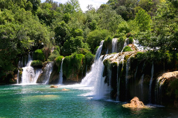 Fototapeta na wymiar Beautiful waterfalls in National Park Krka, Croatia on a sunny summer day. 