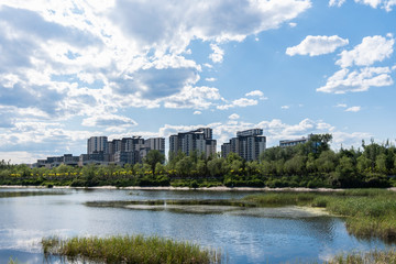 Residential area under blue sky and white clouds