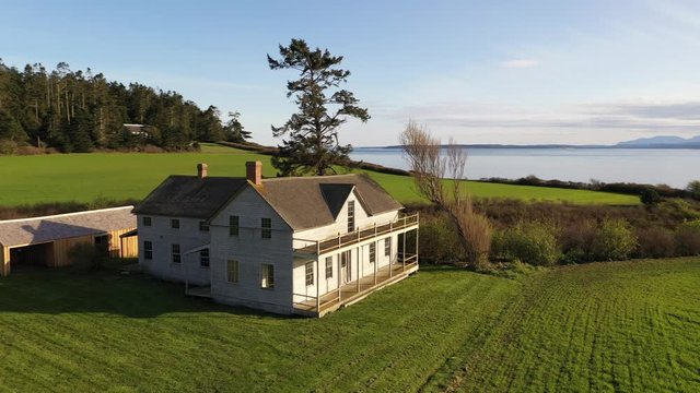 Aerial / drone footage of Ebey's Landing National Historic Reserve by Fort Casey State Park on Whidbey Island near Seattle, Washington during the COVID-19 pandemic closure