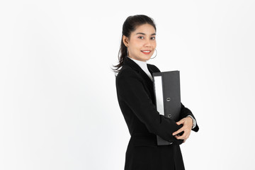 Portrait of confident young Asian business woman in suit hold document folders or ring binder on white isolated background