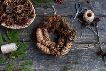 How to make Christmas wreath at home. Step by step photo instruction. Step 13. finish glueing cones. DIY art project