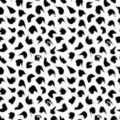 Polka dot grunge seamless vector pattern. Brush strokes circles and rounded forms. Hand drawn abstract ink background.