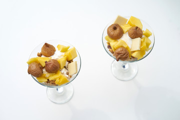 Ice cream with granola, mango and figs breakfast dessert