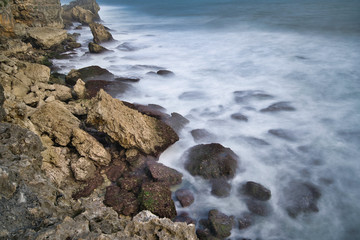 waves crashing on rocks