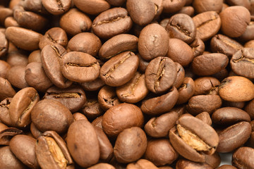 Fragrant roasted coffee grains, close-up