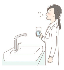 うがいをする女性