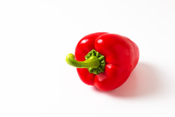 Food concept Single organic red bell pepper or paprika isolated on white background