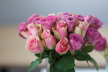 bouquet of pink roses in a vase, rosebuds