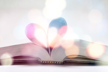 open book with bokeh lights