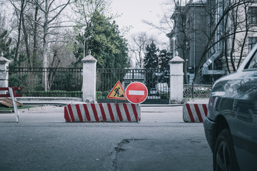 no entry sign on the road. traffic sign no entry. barrier at the road . closed area with roadblock