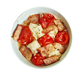 Cod with chopped tomatoes,  crispy pancetta,