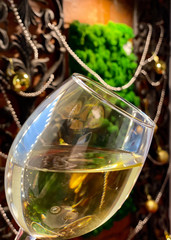 A glass of white wine. Close up view.