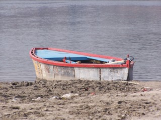 boat on the beach bank of ganges river varanasi uttar pradesh india