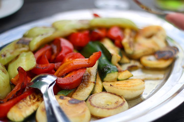 Various grilled vegetables served on a platter. Selective focus.