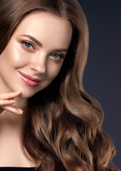 Fototapeta premium Beauty long hair woman curly hairstyle natural makeup