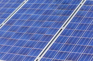 Blue Solar panels surface close up background texture