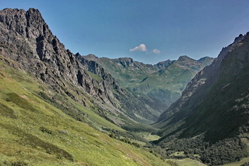 Fototapeta na wymiar Pass Aishho on the background of cloudless sky, a small Caucasus mountains, the Caucasus biosphere reserve, panorama, summer landscape