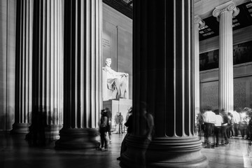 Lincoln Memorial at night with motion blurred visitors - Washington D.C. United States of America