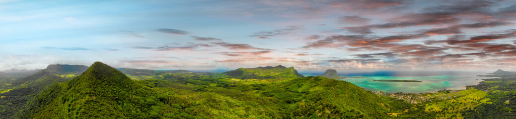 Fototapeta na wymiar Panoramic aerial view of Mauritius coastline, Africa. Sunny day with ocean and vegetation