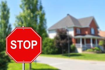 Stop sign at an intersection with a street