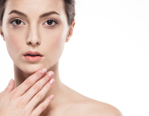 Young beautiful woman with hands  portrait with healthy skin studio on white