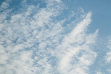 Spindrift beautiful white clouds. blue sky background