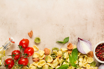 Culinary food cooking background with traditional ingredients for the preparation of Italian pasta. Top view.
