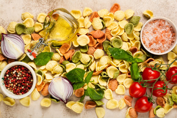Culinary food cooking background with traditional ingredients for the preparation of Italian pasta. Top view.