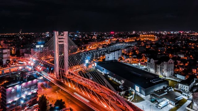 Aerial time lapse of Basarab bridge overpass Bucharest at night while lightning