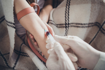 Cropped closeup photo of patient lady guy doc injection sample probe vein blood covid antibodies...