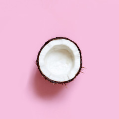 Coconut piece on a light pink background