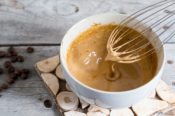 dalgona coffee making process, whipped instant coffee. cream coffee, iced coffee