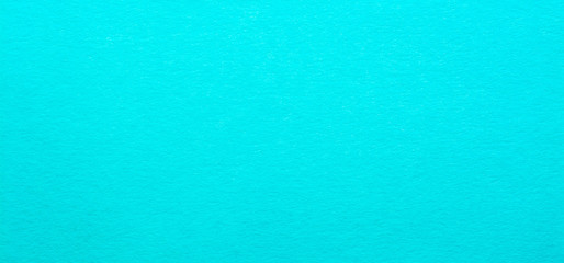 Fototapeta na wymiar Good quality porous soft light blue color cardboard paper texture close-up.