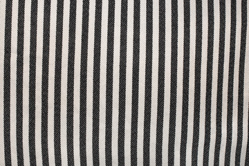 Fototapeta premium Black striped fabric texture as background