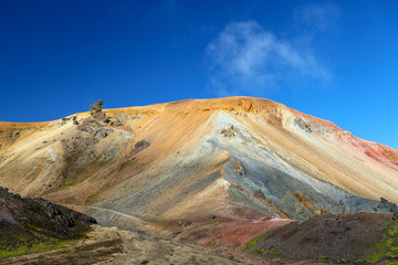 Landscape in Iceland. Green moss over the  volcanic mountains and lava fields in Landmannalaugar national park. Beautiful colored mountains and lava fields.Surreal nature scenery in highland.