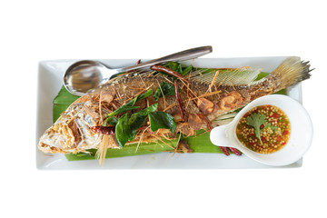 fried fish with thai herb white background