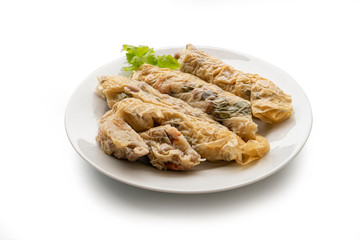 steam radish rolls, food made from Chinese radishes dried shrimp, shiitake mushroom and peanuts rolled with tofu sheets