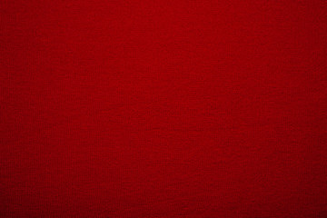 Red fabric texture as background with copyspace