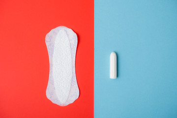 Daily white pad and tampon for menstruation. Menstruation background.