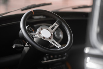 steering wheel of an old racing car