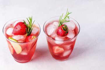 Glasses of Fresh and Cold Strawbery and Green Apple Lemonade Tasty and Healthy Summer Drink Cold Berry and Fruit Lemonade