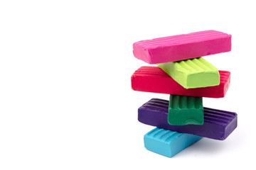 Сolorful plasticine isolated on white background. Space for text