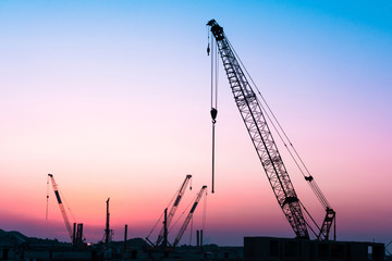 Construction site colorful sunset background