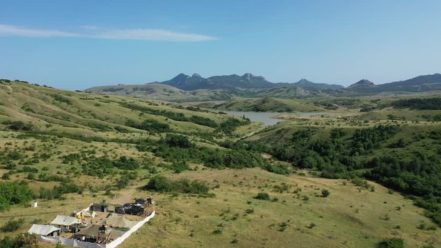 Airsoft. Aerial view. United States military base in Afghanistan. Dirt road.