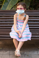 Girl with protective mask during the COVID19 pandemic