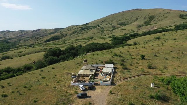 Airsoft. Aerial view. United States military base in Afghanistan. Dirt road.
