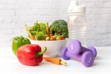 Diet Healthy food and lifestyle health concept. Sport exercise equipment workout and gym...