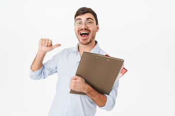 Photo of joyful man holding file and pointing finger at himself